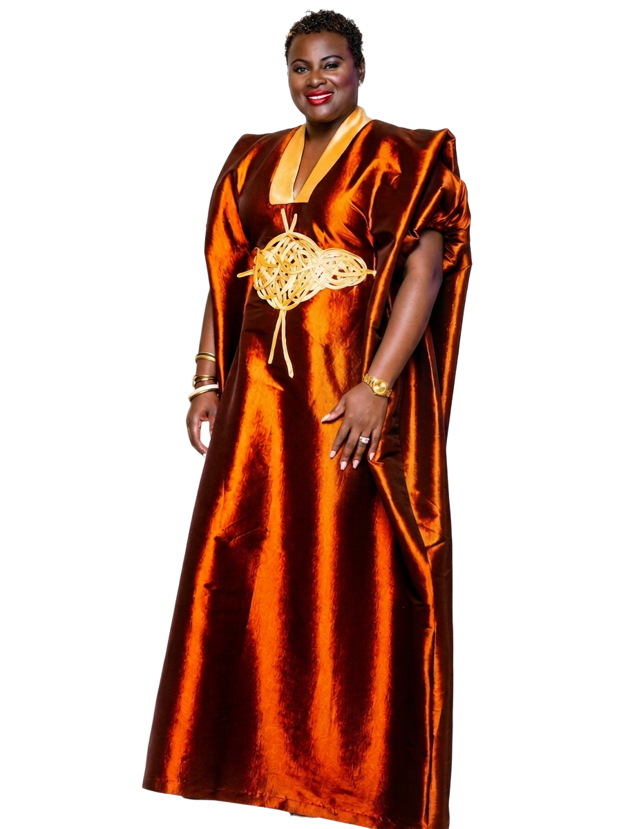 Haja F. Jabbie in a gold sequined gown